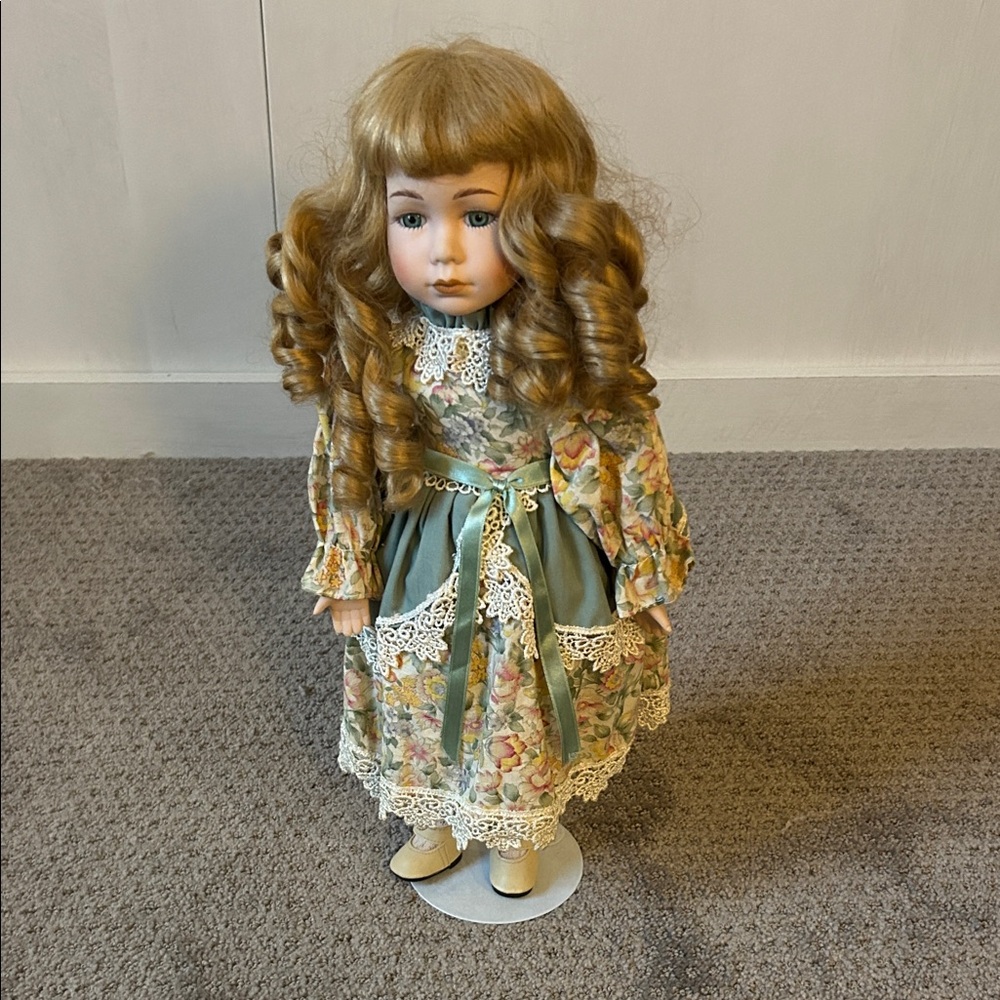 Vintage Style Porcelain Doll with Curly Hair